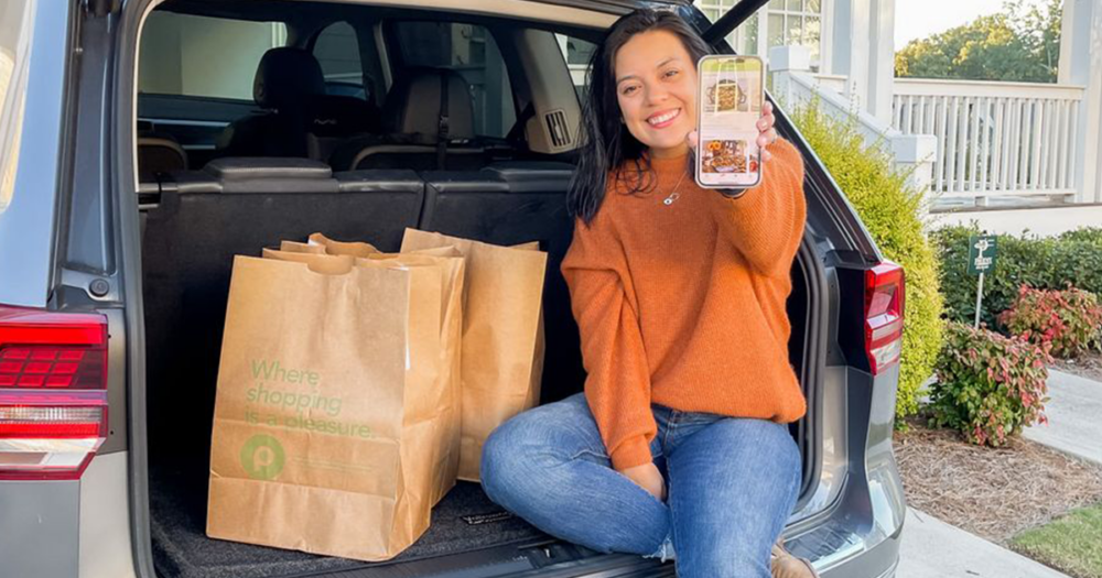 A person using an alternative grocery pickup and delivery service